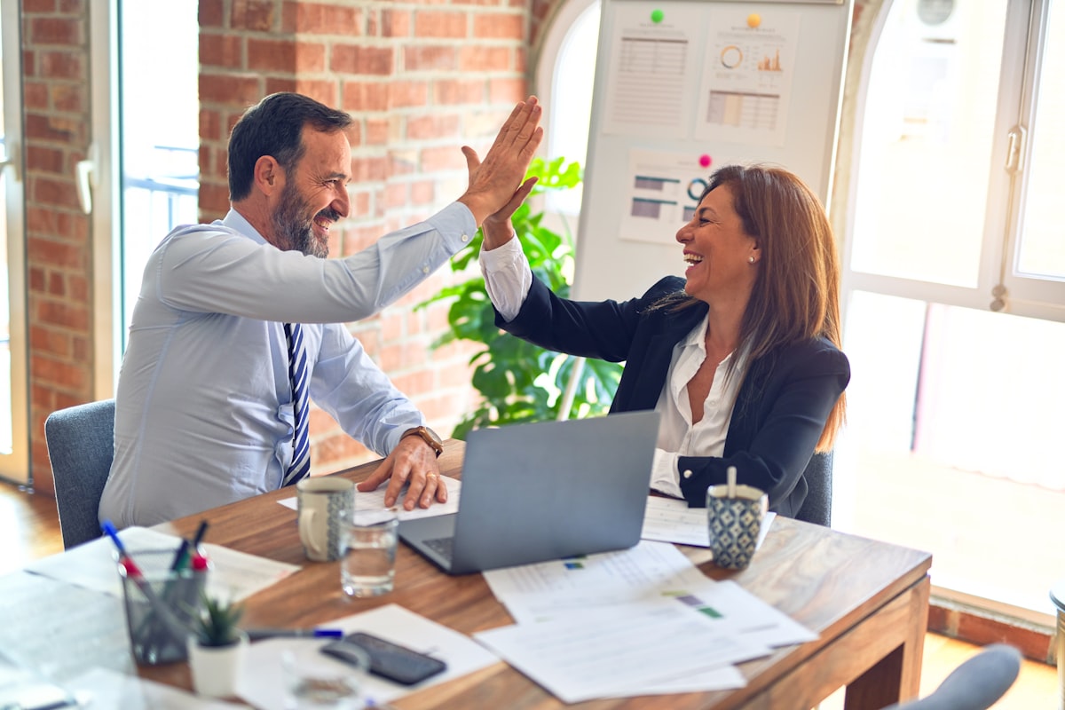 Two people discussing a technical design